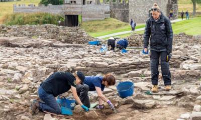 Archaeologists digging at vindolanda min 1024x614